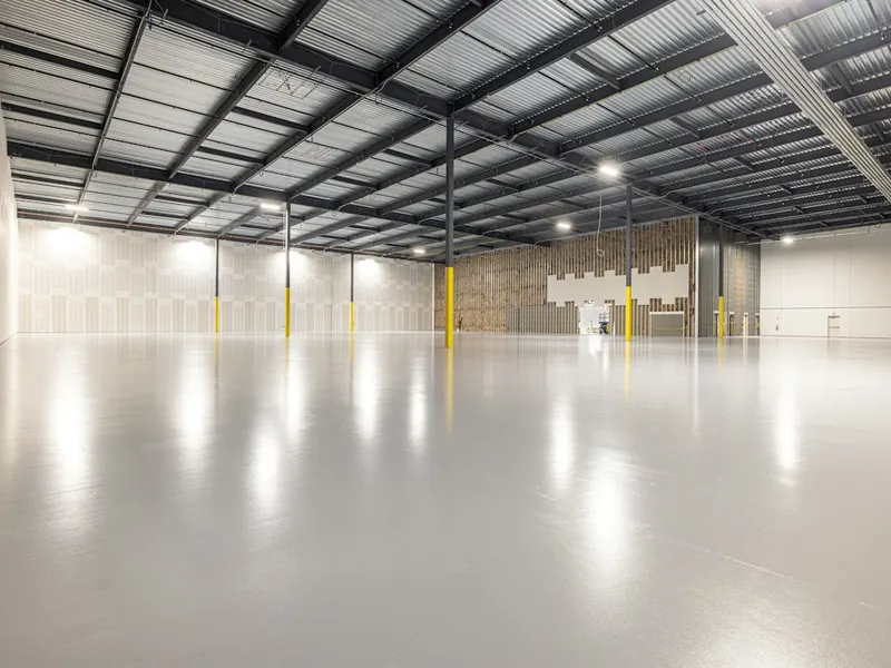 Glossy epoxy-coated commercial warehouse floor